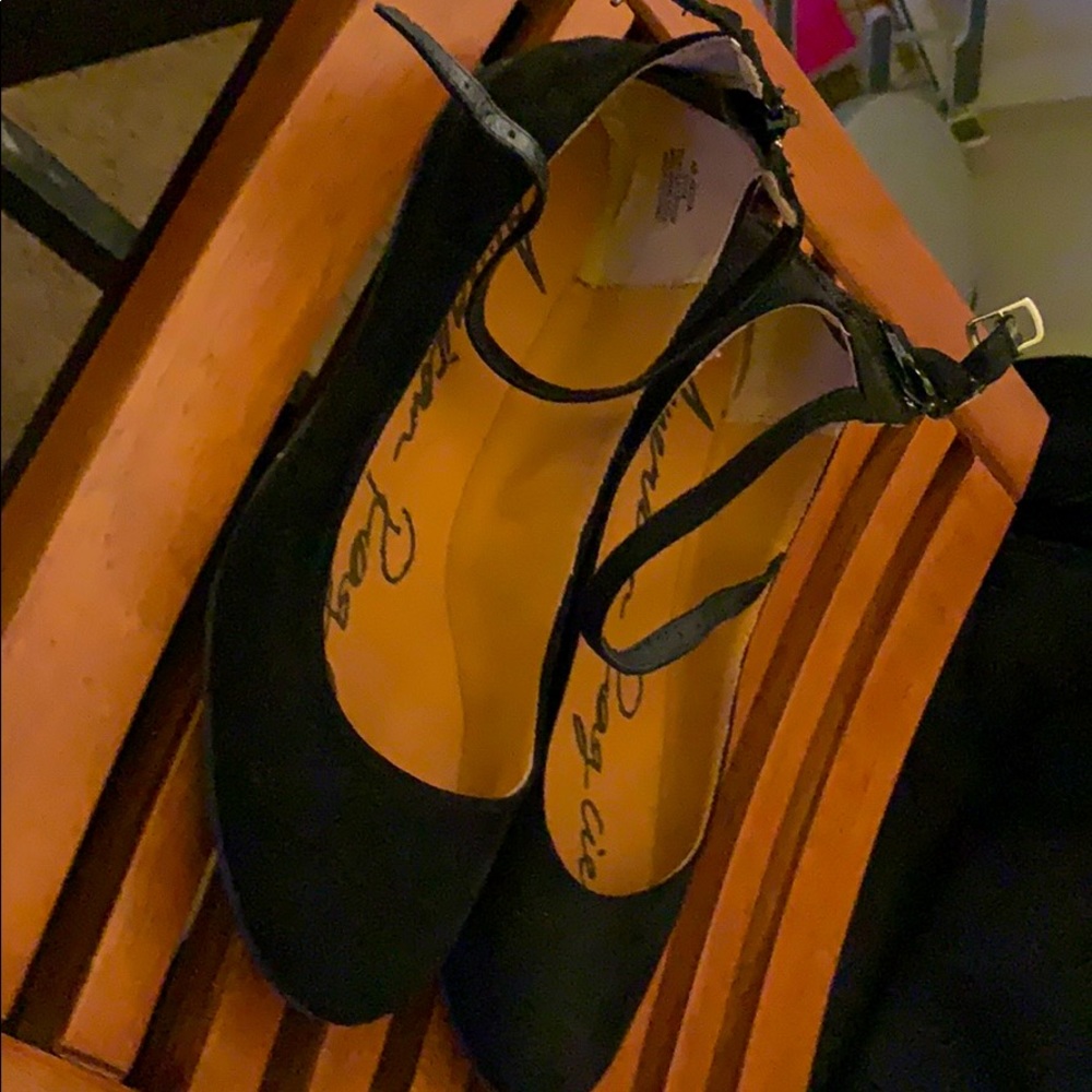 Black flats with ankle strap